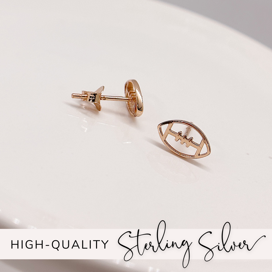 Tiny sterling silver football earrings in rose gold.