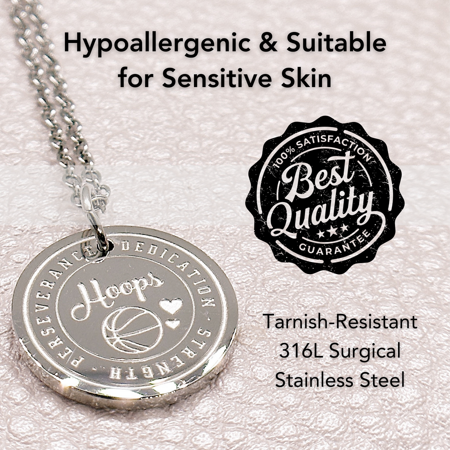 Hypoallergenic silver basketball disc charm necklace, suitable for sensitive skin.