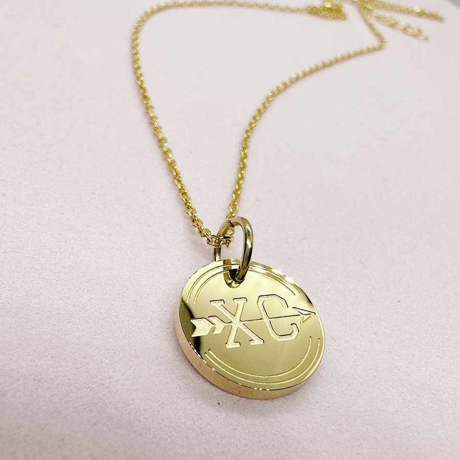 Gold Cross Country disc charm necklace. 