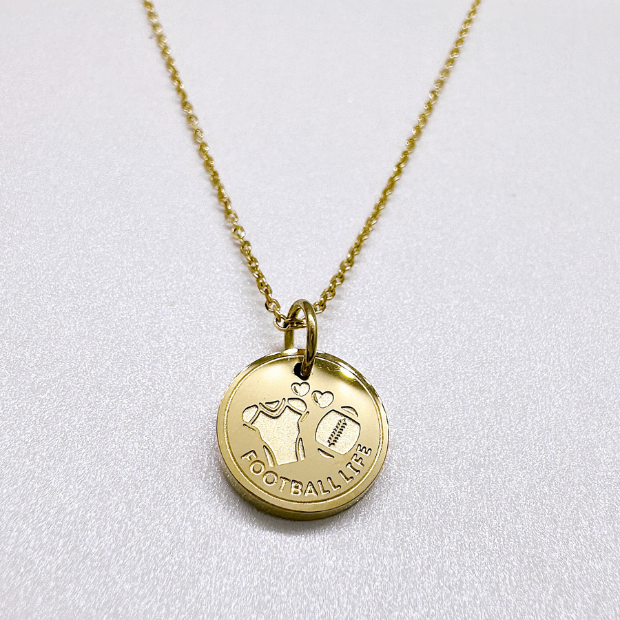 Gold football disc charm necklace.