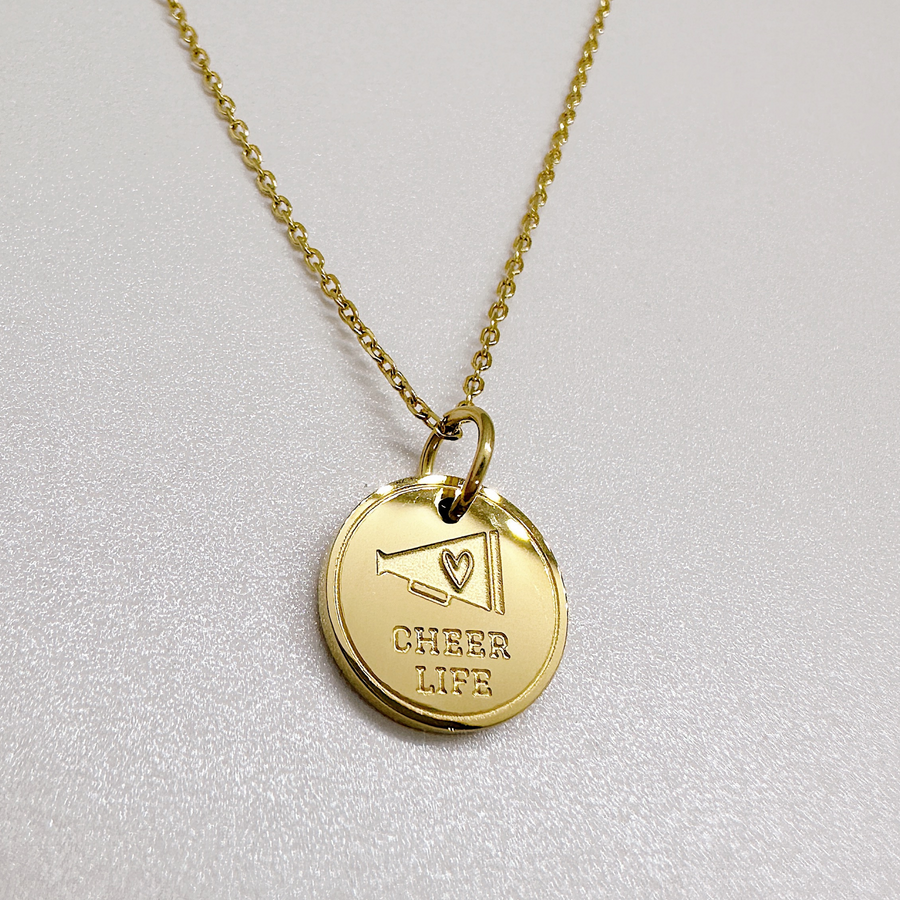 Gold cheer disc charm necklace.