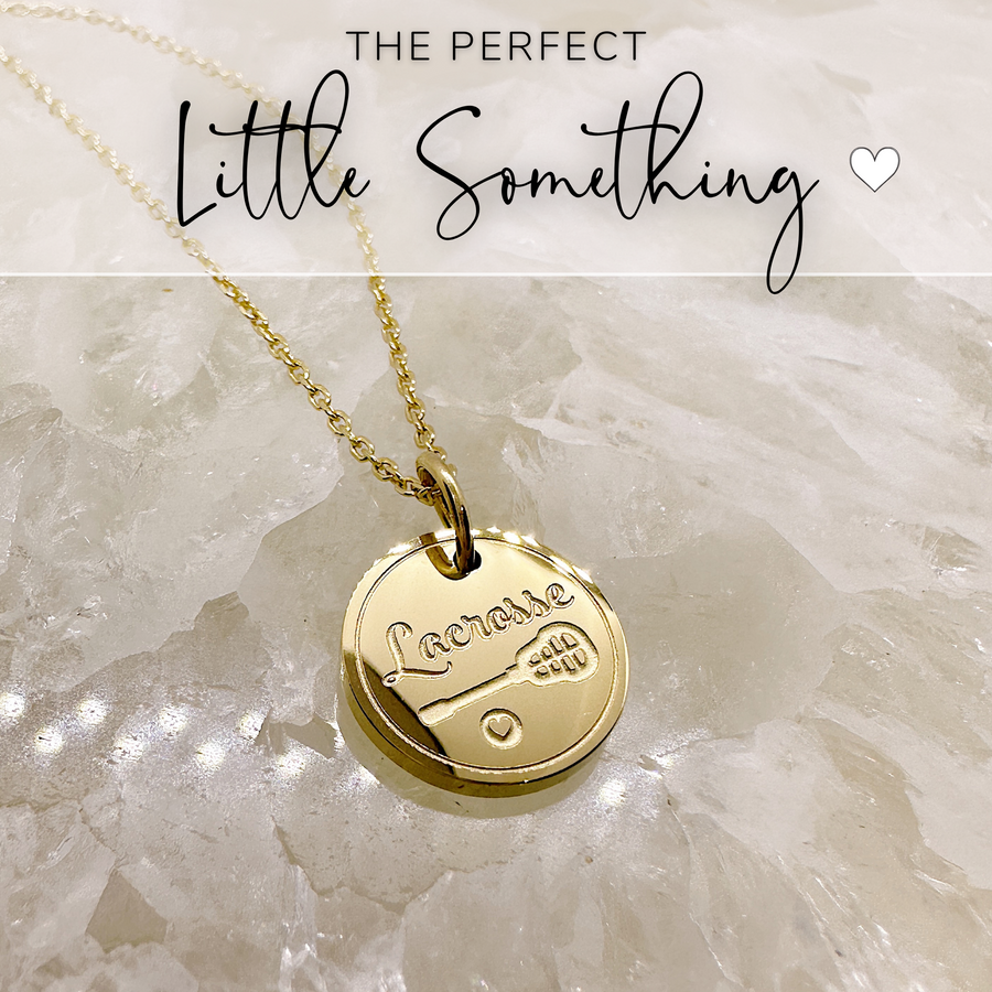That perfect little something, lacrosse disc charm necklace.