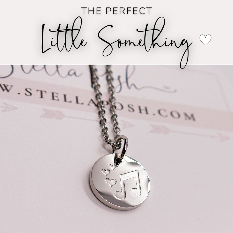 That perfect little something music note disc charm necklace.