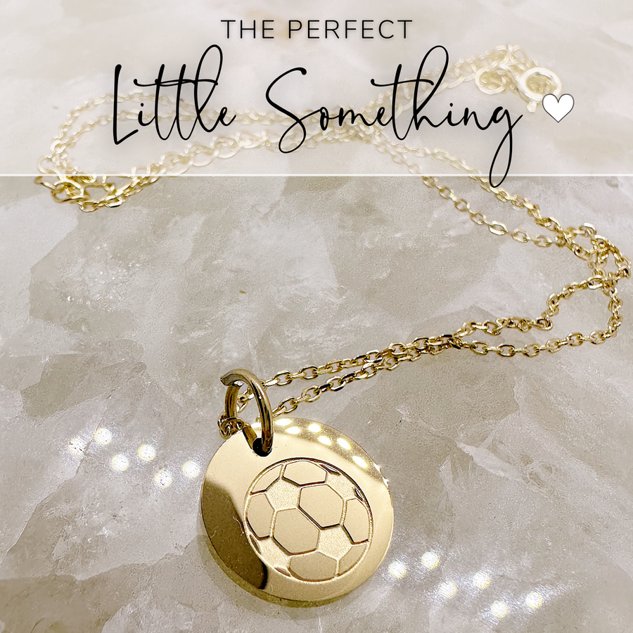 That perfect little something, soccer disc charm necklace.