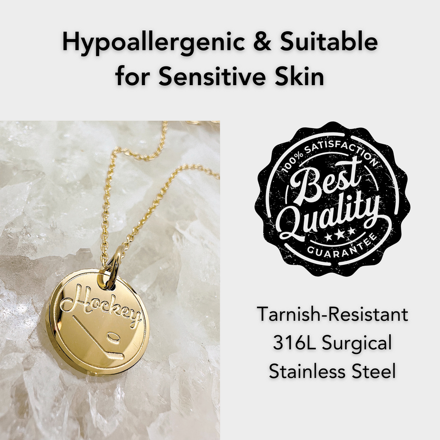 Hypoallergenic gold hockey disc charm necklace, suitable for sensitive skin.
