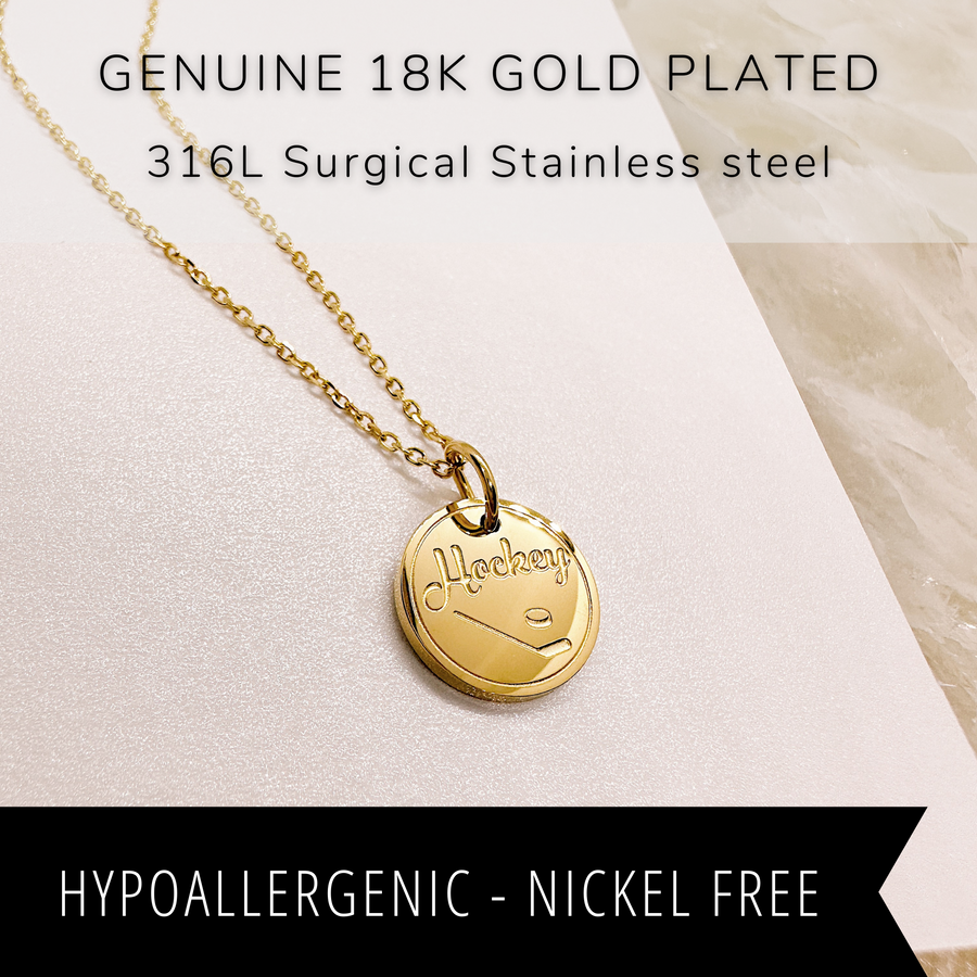 18K gold plated hockey charm necklace.