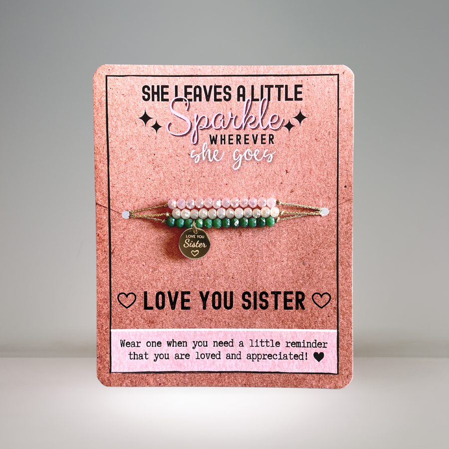 Love You Sister Charm Bracelet set with 14K Gold plated 'Love You Sister' charm.
