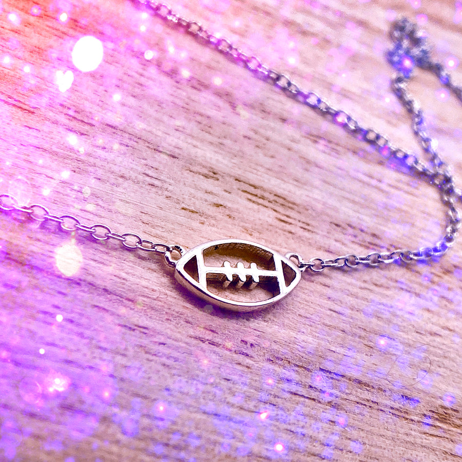 .925 silver Tiny Football Necklace in rose gold.