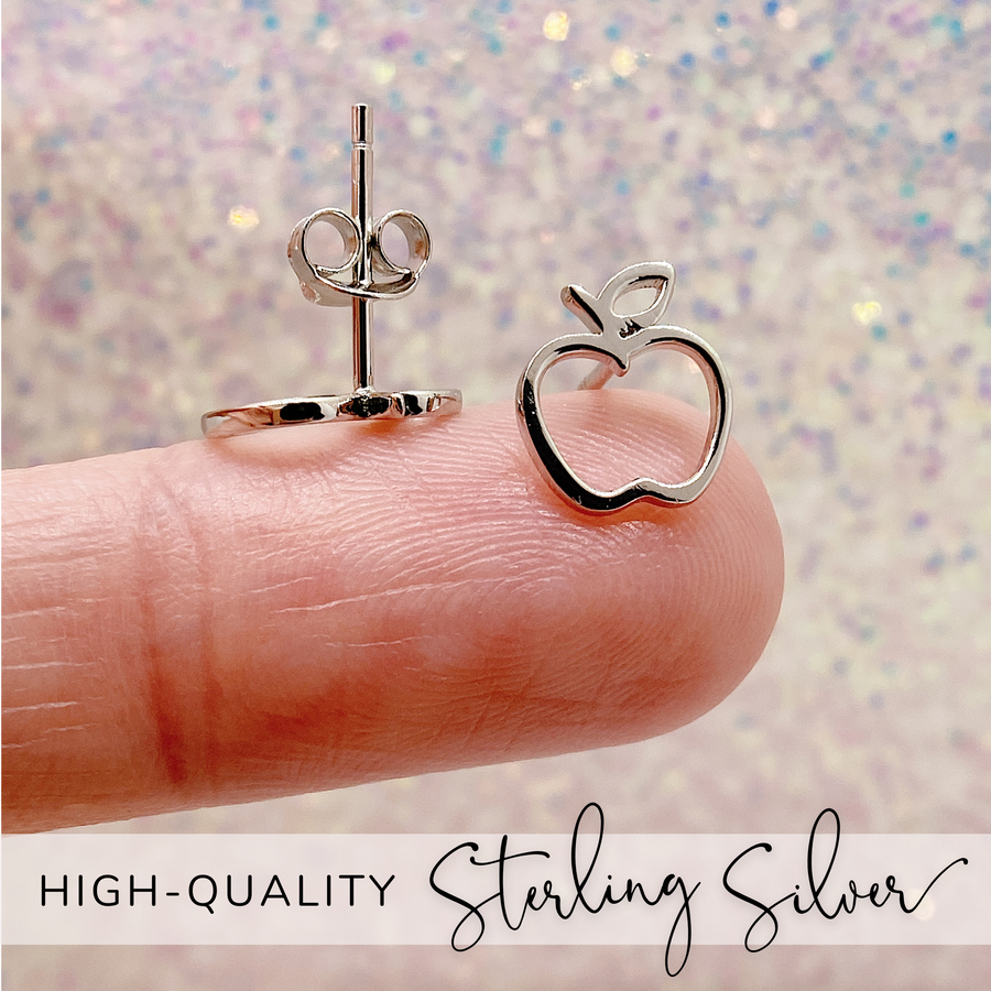 Delicate .925 sterling silver Apple Earrings shown on finger for scale. Perfect for Teacher Gift.