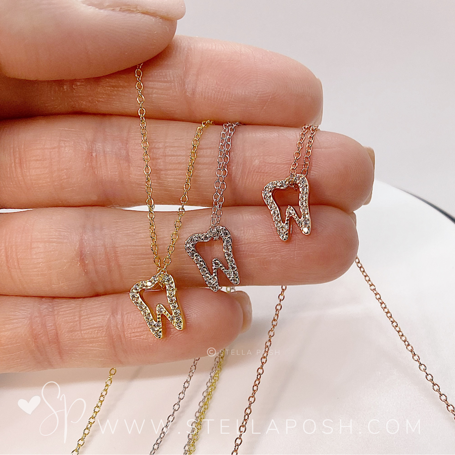 .925 silver Tooth Necklaces in silver, gold and rose gold.